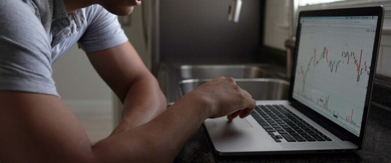 Man using his laptop to trade