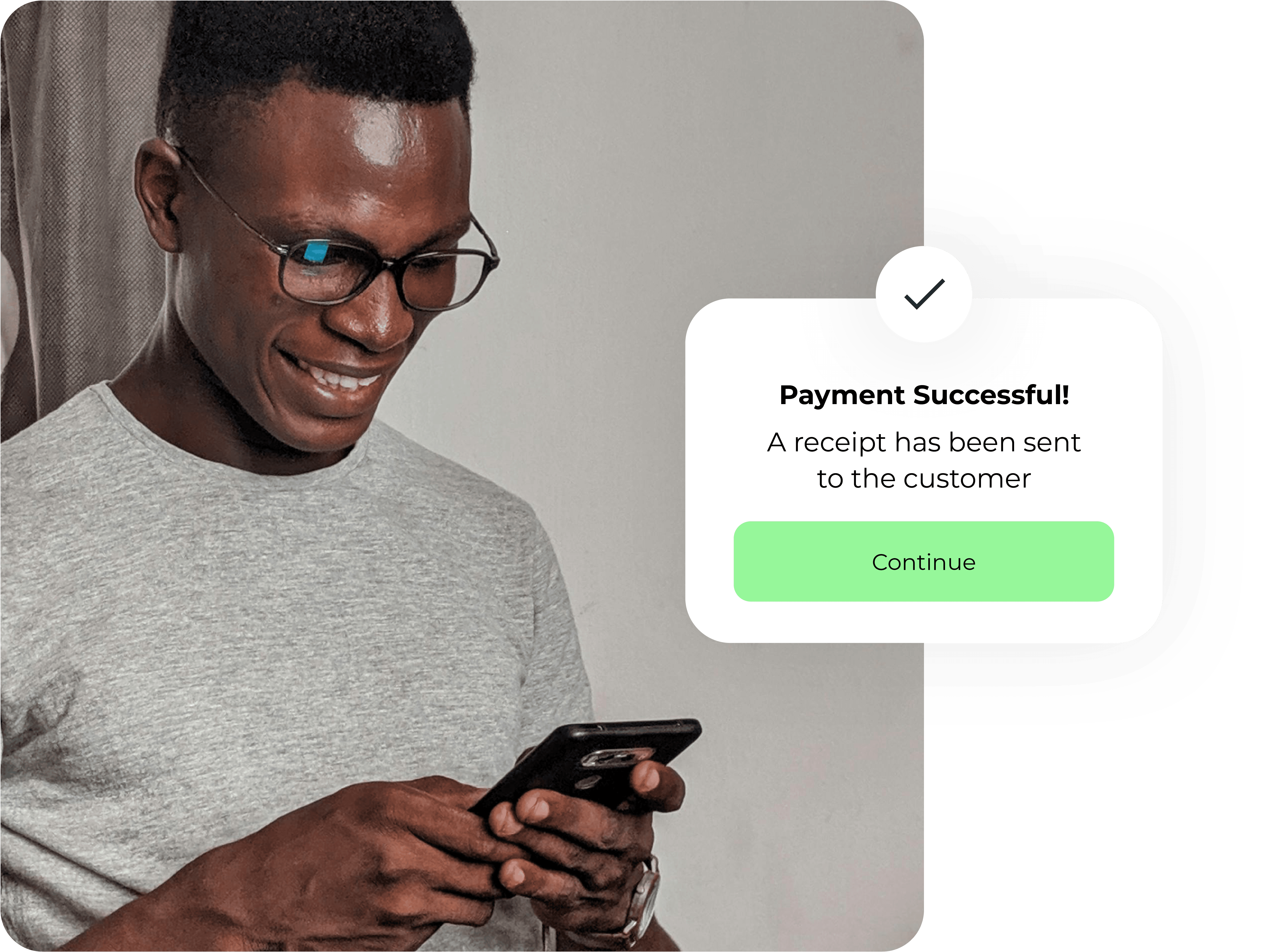 Man on his phone with a payment successful notification