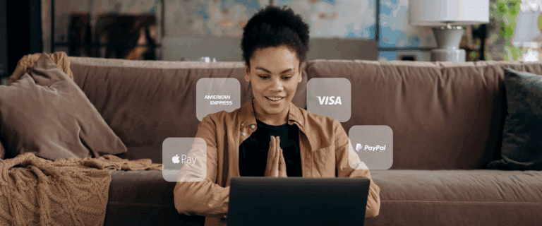 A woman on her laptop with different APM logos floating around her