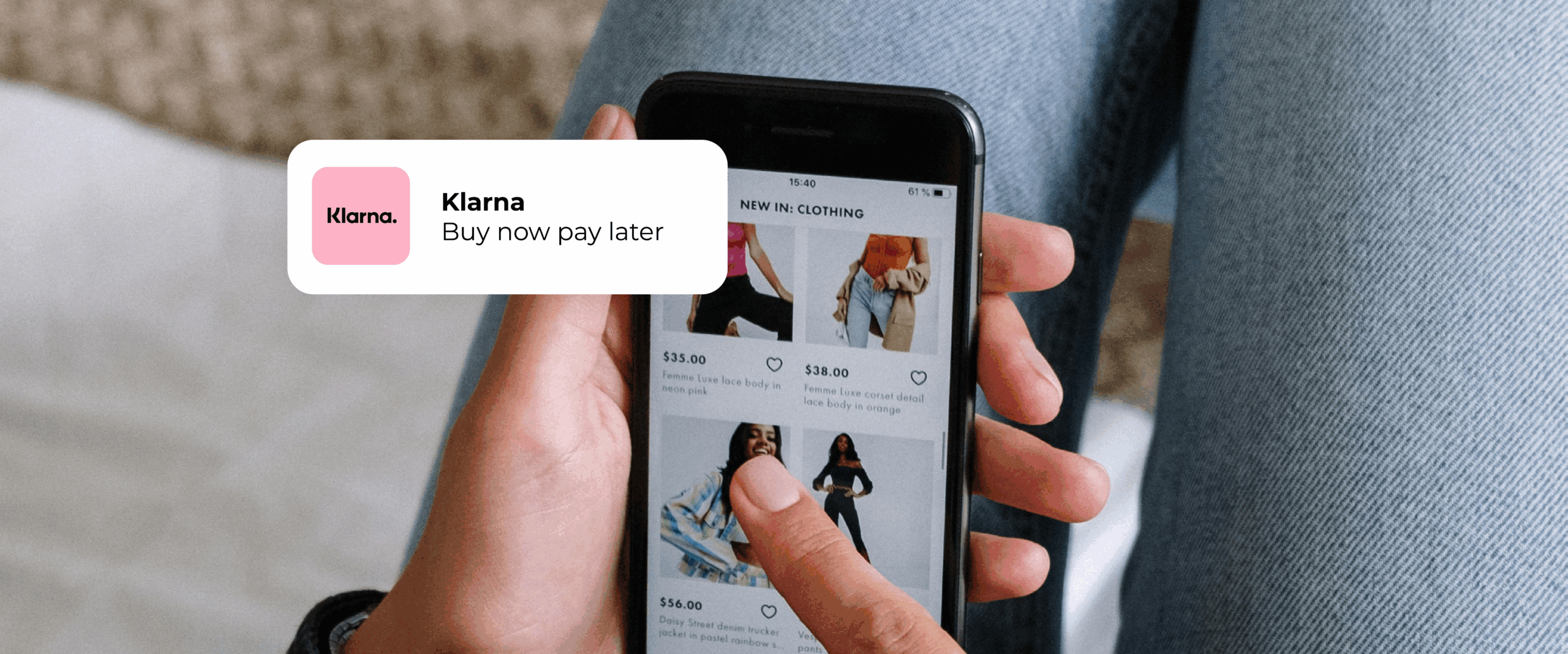 A woman shopping on her phone with a Klanra BNPL pop up showing how she's going to pay